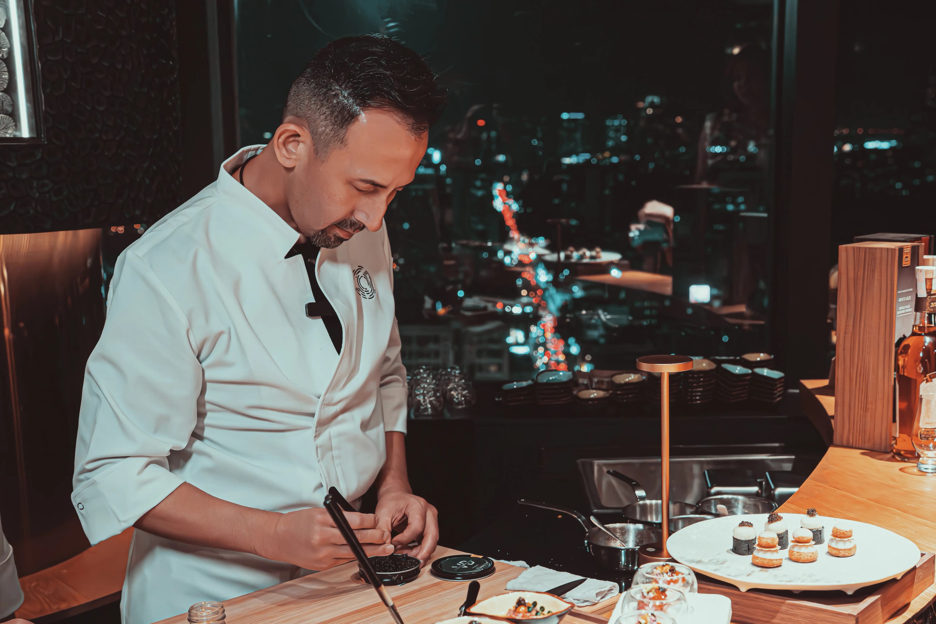 Deviled eggs crowned with caviar pearls