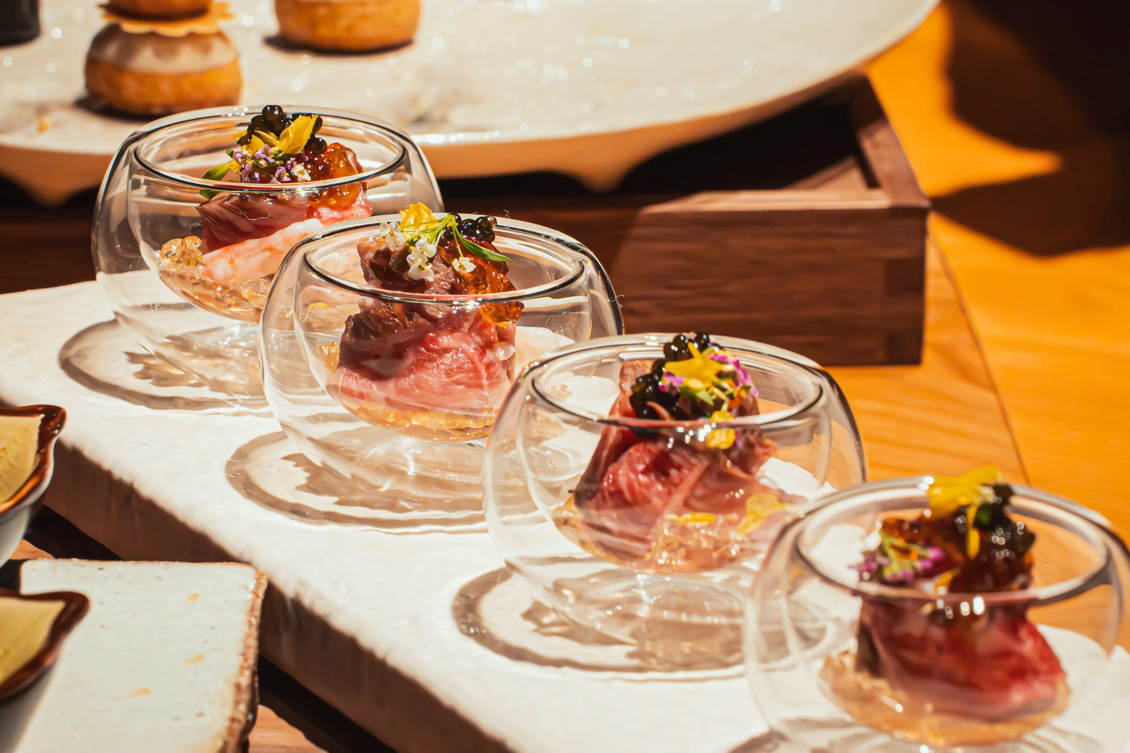 Hand holding open caviar tin