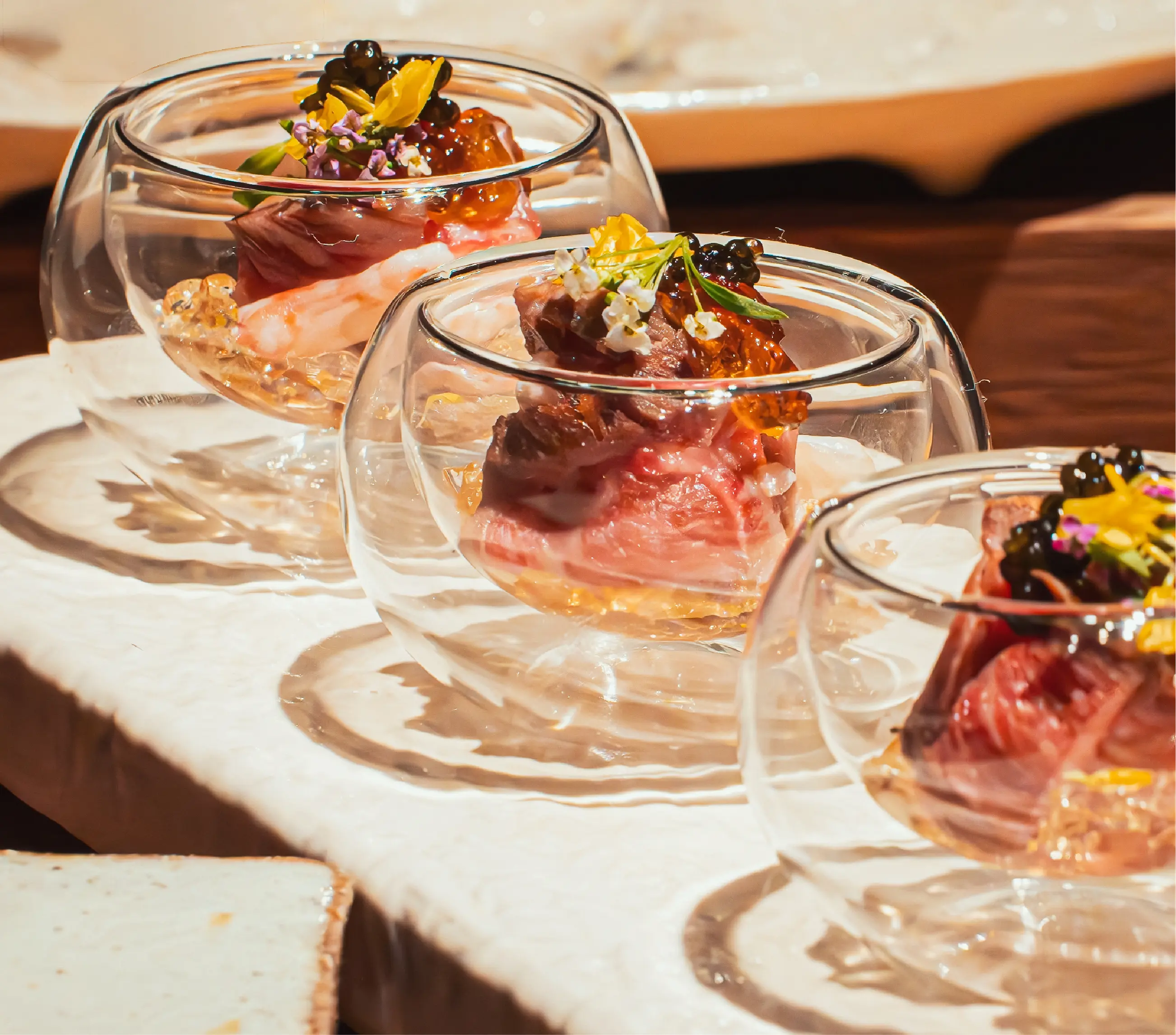 Hand holding open caviar tin